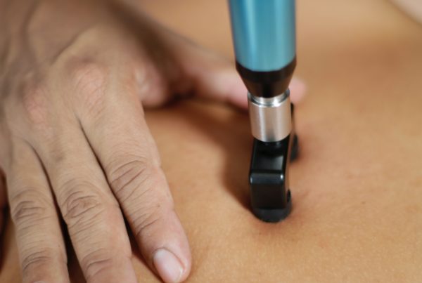 chiropractor using activator